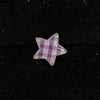 Purple checkered star piercing