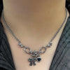 Ribbon heart piercing necklace