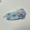 Blue kitty star wand hair clip