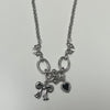 Ribbon heart piercing necklace