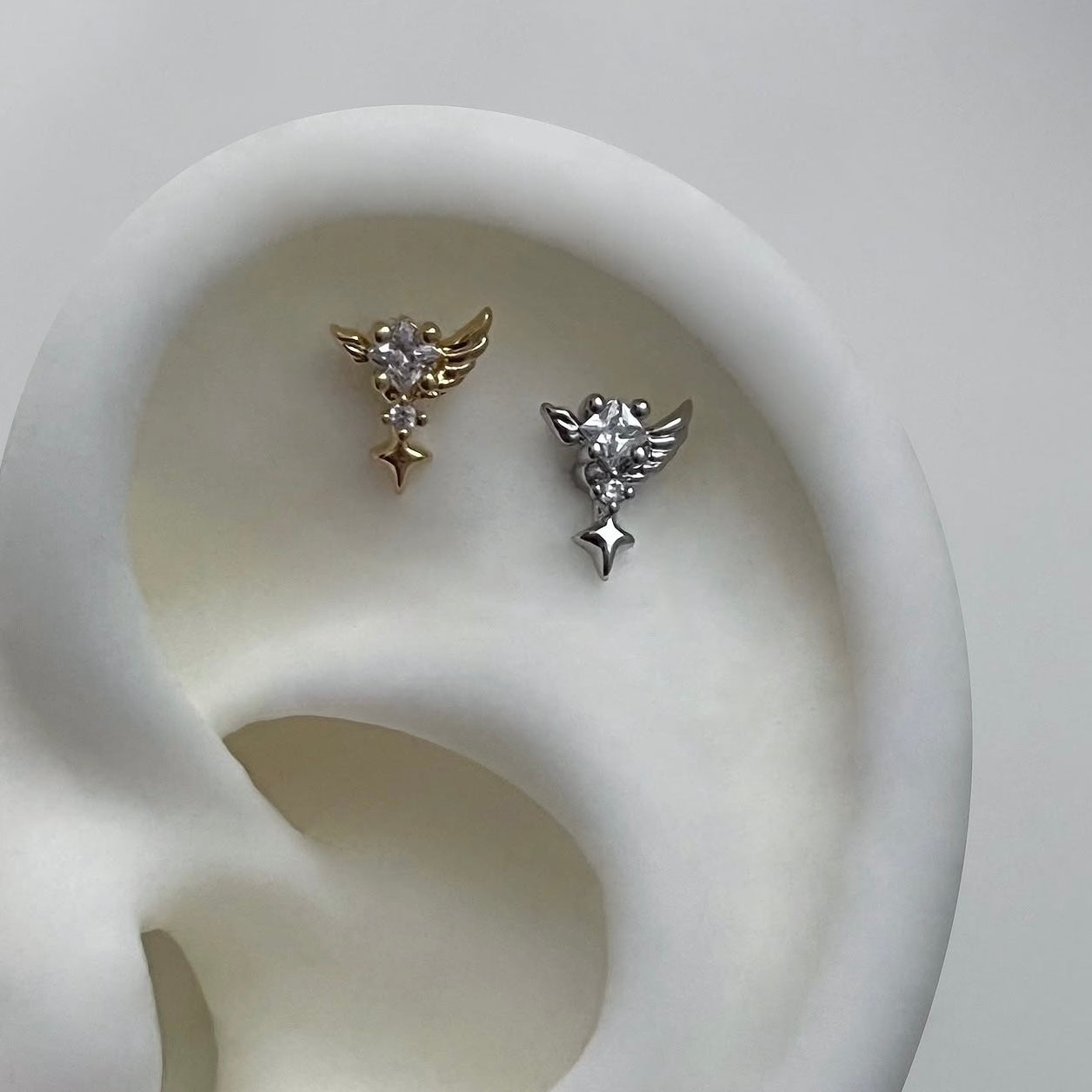 Sparkle wing piercing – TOOFOOFEEFA