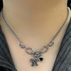 Ribbon heart piercing necklace