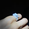 white rabbit pinky ring
