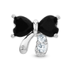Black and silver bow piercing
