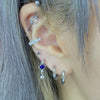 Blue heart drop piercing