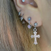 Silver spike hoop piercings