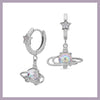 Clear saturn hoop earrings