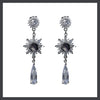 Black sun drop earrings
