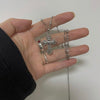 Heart down cross twist necklace
