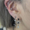 Chrome spike cross and cupid heart ear set