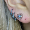 Steel blue double spike hoop piercings