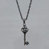 Fancy key dark silver shiny chain necklace