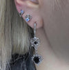 Black sparkle star piercing