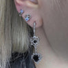 Black sparkle star piercing