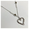 Melting heart pearl necklace