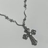 Heart down cross twist necklace