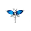 Blue dragonfly piercing
